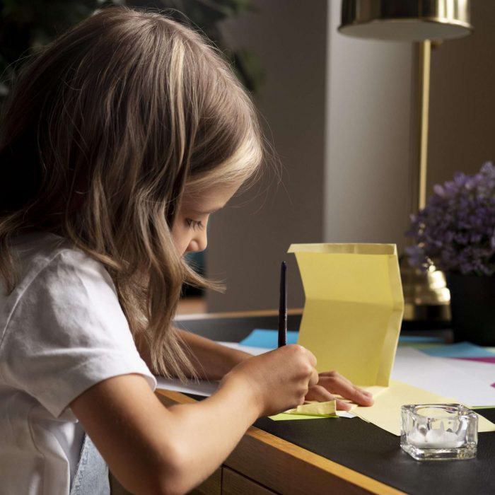 close up girl painting with brush scaled